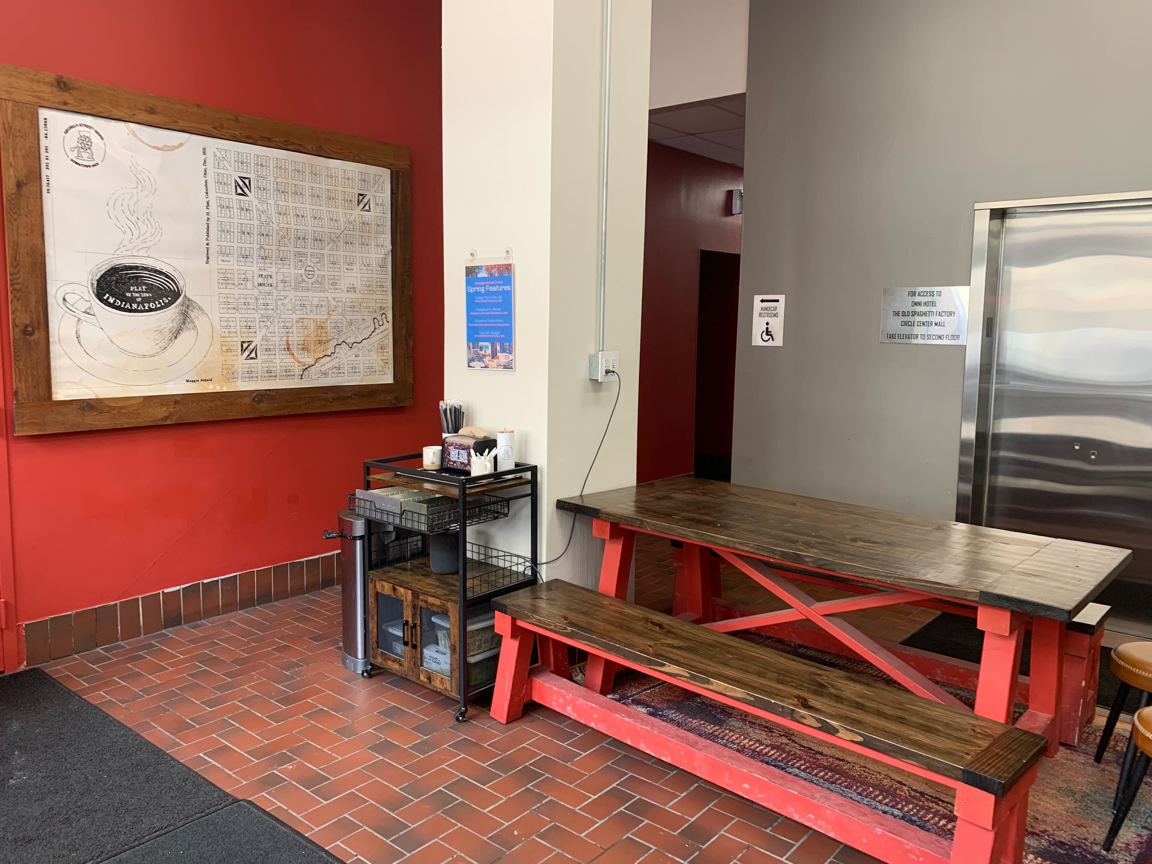 Georgia Street Grind interior — community table and seating area